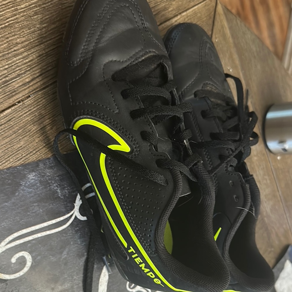Nike Black and Yellow Athletic youth soccer cleats with Breathable Mesh